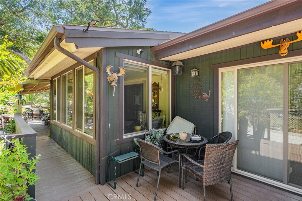 1126 Katherine Road Simi Valley, CA 93063 - Photo 50 of 66 a patio with yard glass top table and chairs