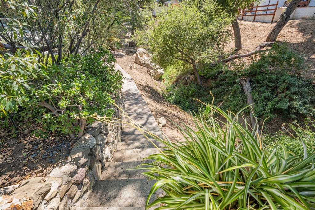 1126 Katherine Road Simi Valley, CA 93063 - Photo 60 of 66 a backyard of a house with lots of trees