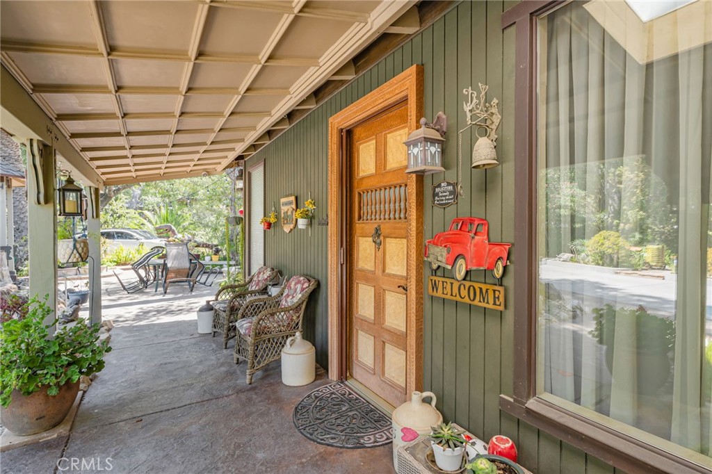 1126 Katherine Road Simi Valley, CA 93063 - Photo 6 of 66 a living room filled with furniture and a potted plant