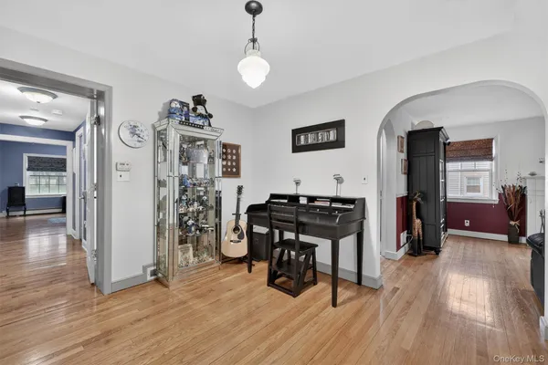 a view of a livingroom with furniture and wooden floor