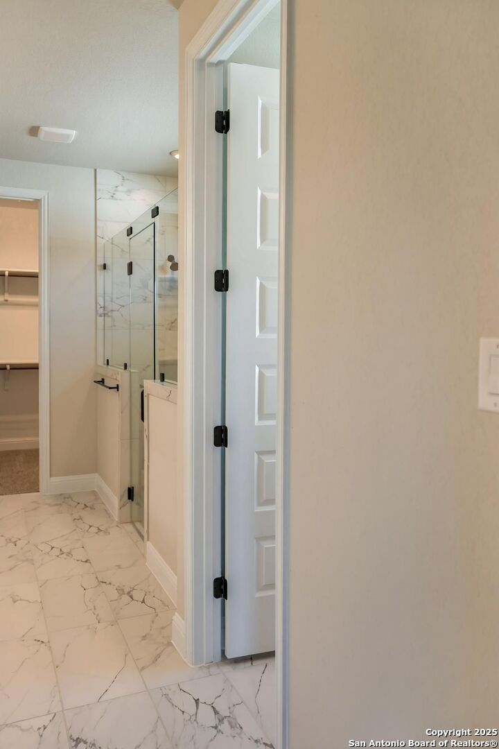 29354 Cheyenne Ridge Fair Oaks Ranch, TX 78015 - Photo 6 of 14 a bathroom with a shower and a sink