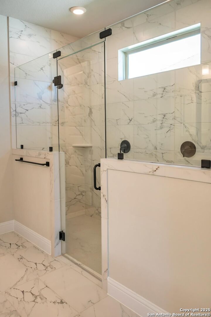 29354 Cheyenne Ridge Fair Oaks Ranch, TX 78015 - Photo 9 of 14 a bathroom with a shower and a sink