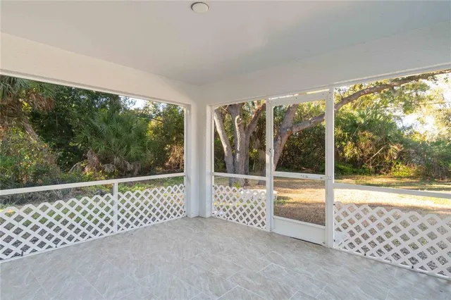 a view of a yard with large tree