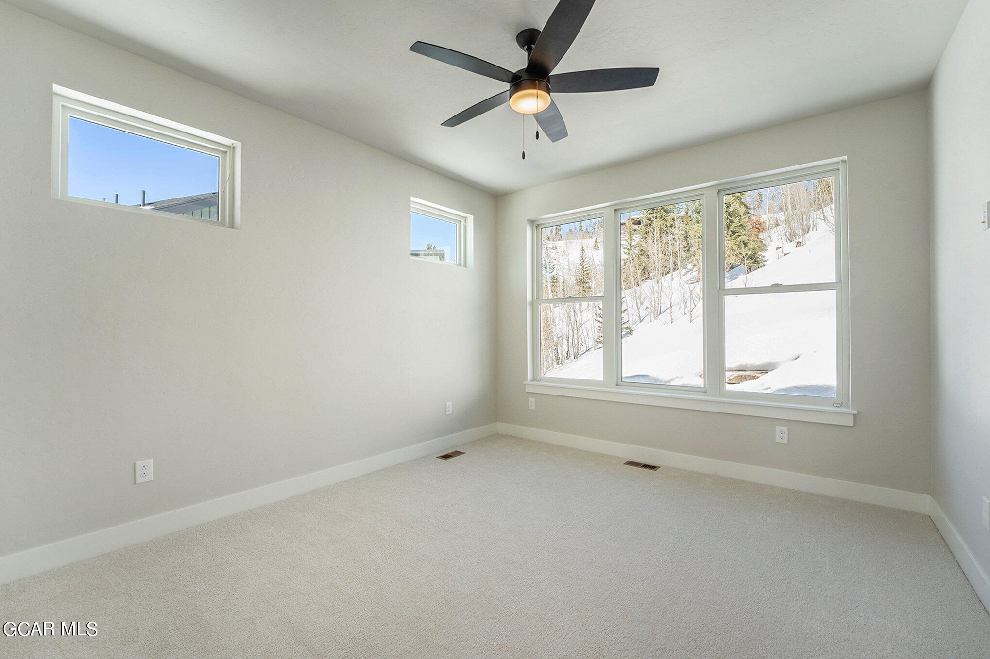 186 Homestead Loop Fraser, CO 80442 - Photo 22 of 29 a view of an empty room with a window