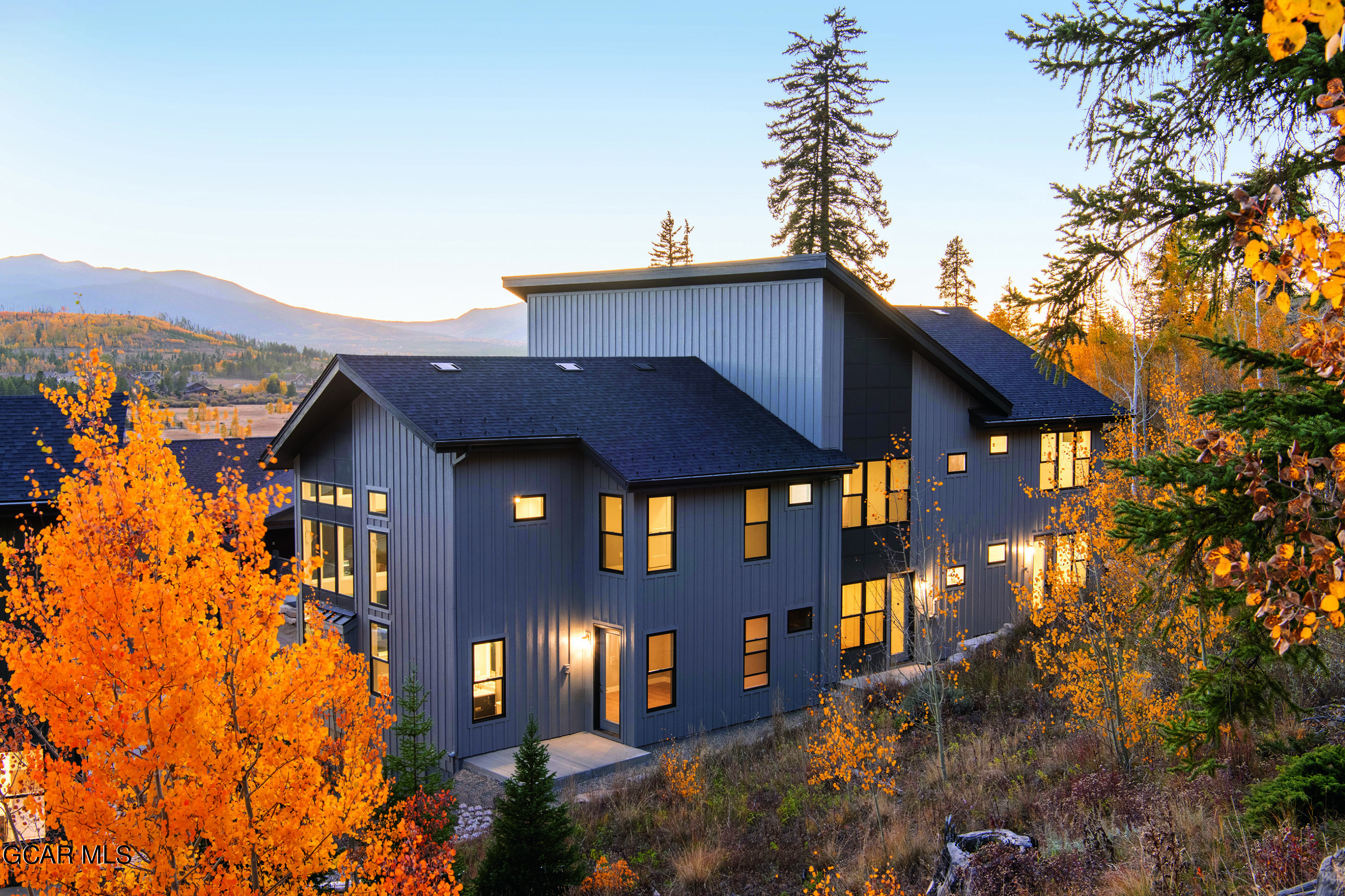 186 Homestead Loop Fraser, CO 80442 - Photo 4 of 29 a front view of a house with a yard