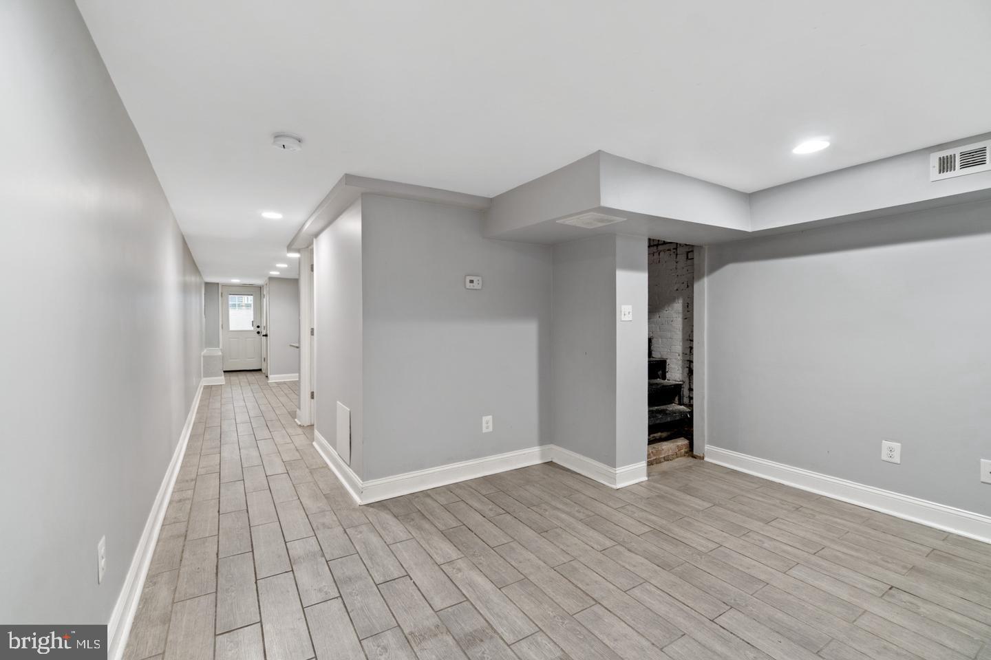 3416 Toone Street Baltimore, MD 21224 - Photo 5 of 18 a view of entryway with wooden floor