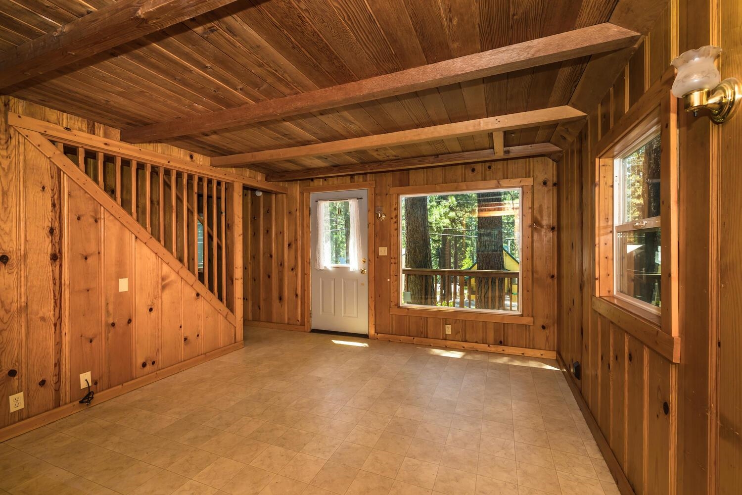 13464 Moraine Road Truckee, CA 96161 - Photo 12 of 25 a view of a porch with wooden floor and stairs