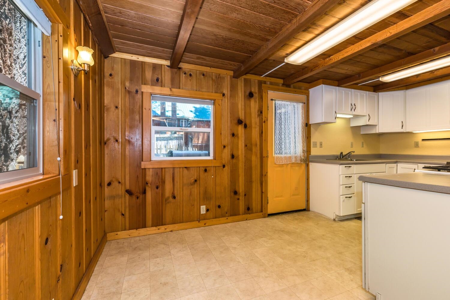 13464 Moraine Road Truckee, CA 96161 - Photo 16 of 25 a view of a refrigerator in kitchen and a window