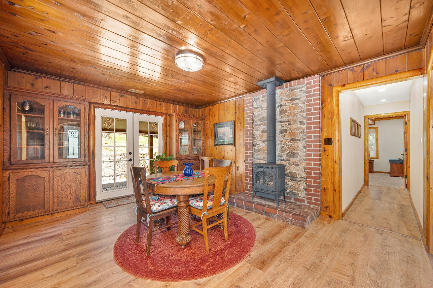 3240 Lone Star Mine Road Placerville, CA 95667 - Photo 17 of 59 a dining room with furniture window and wooden floor