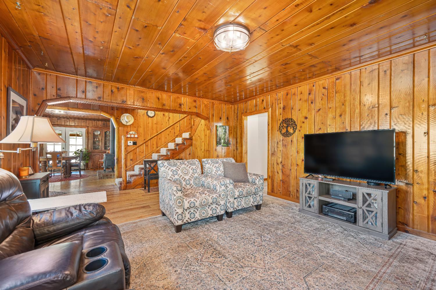 3240 Lone Star Mine Road Placerville, CA 95667 - Photo 18 of 59 a living room with furniture and a flat screen tv