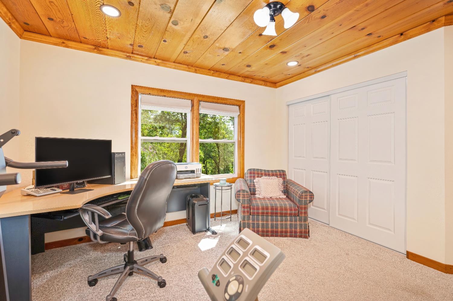 3240 Lone Star Mine Road Placerville, CA 95667 - Photo 27 of 59 a work room with furniture and a flat screen tv