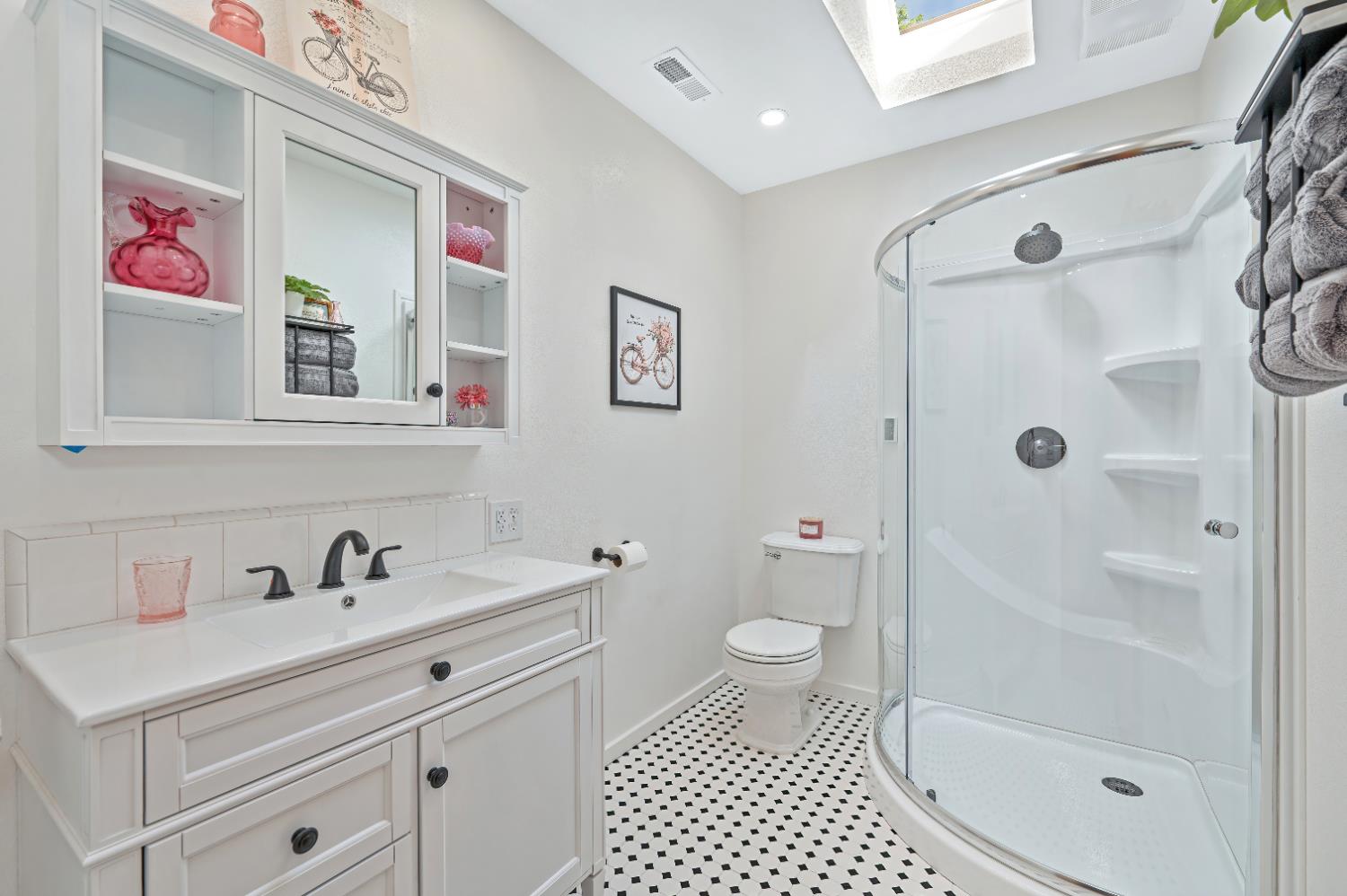 3240 Lone Star Mine Road Placerville, CA 95667 - Photo 28 of 59 a bathroom with a sink a toilet and a shower