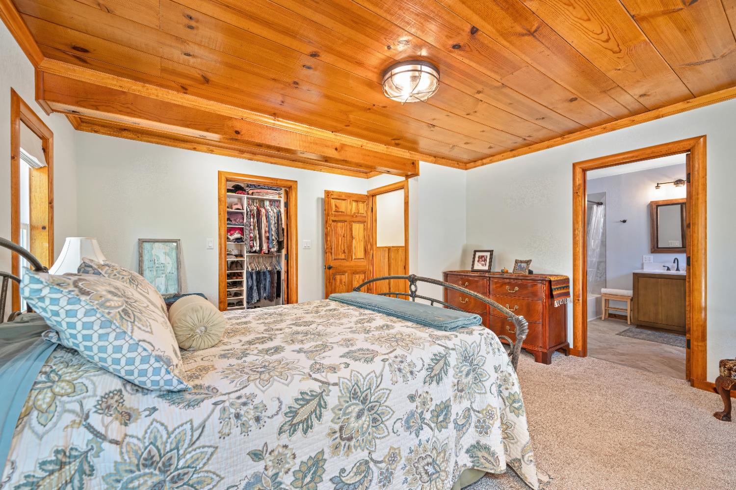 3240 Lone Star Mine Road Placerville, CA 95667 - Photo 30 of 59 a bedroom with a large bed and a large bed