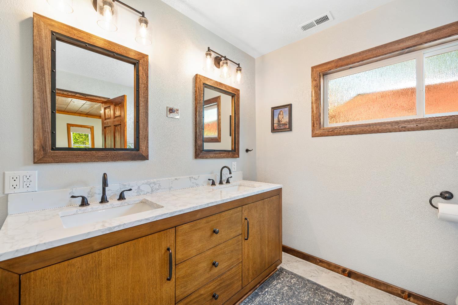 3240 Lone Star Mine Road Placerville, CA 95667 - Photo 32 of 59 a bathroom with 2 sink and a mirror