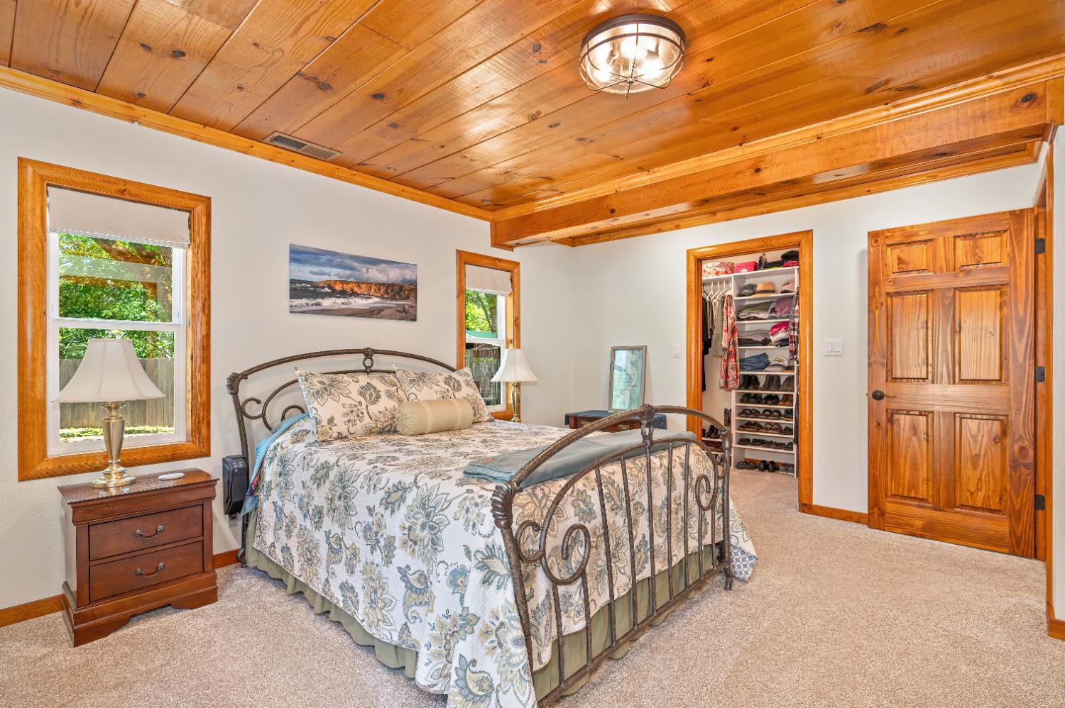 3240 Lone Star Mine Road Placerville, CA 95667 - Photo 35 of 59 a bedroom with a bed and a dresser next to a window