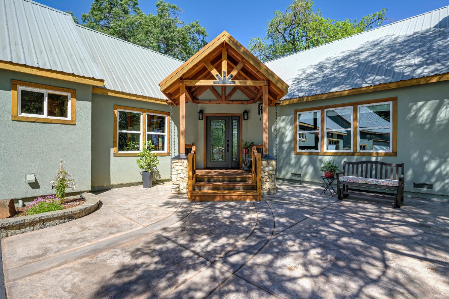 3240 Lone Star Mine Road Placerville, CA 95667 - Photo 5 of 59 a front view of a house with a porch