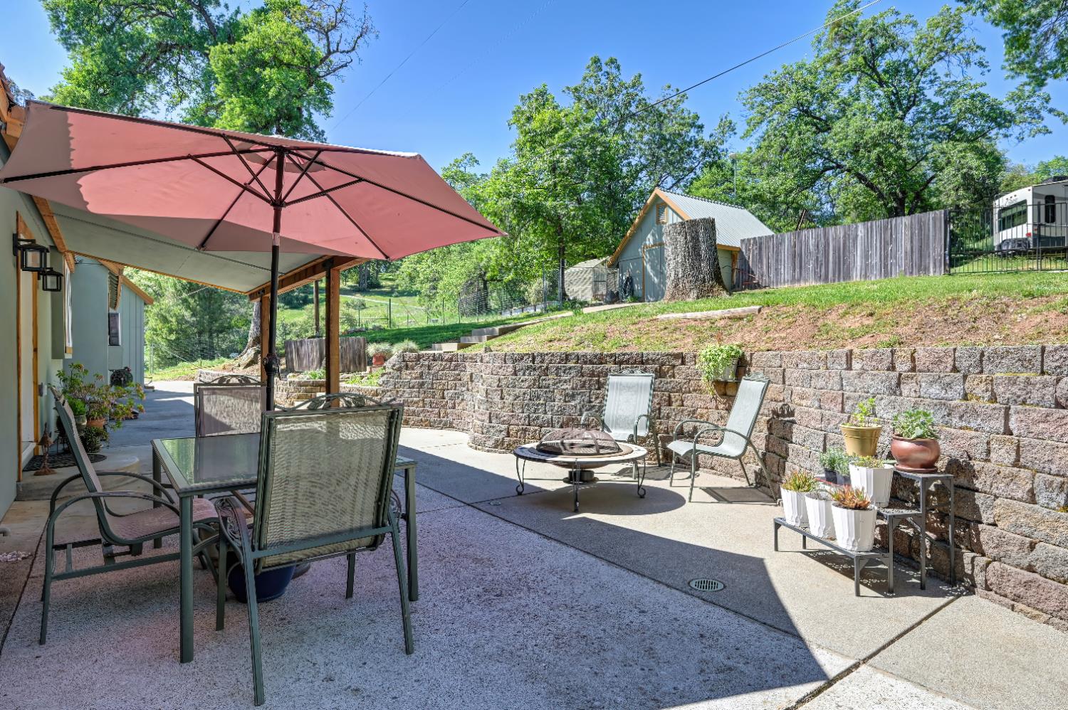 3240 Lone Star Mine Road Placerville, CA 95667 - Photo 58 of 59 a view of patio with chairs and table under an umbrella