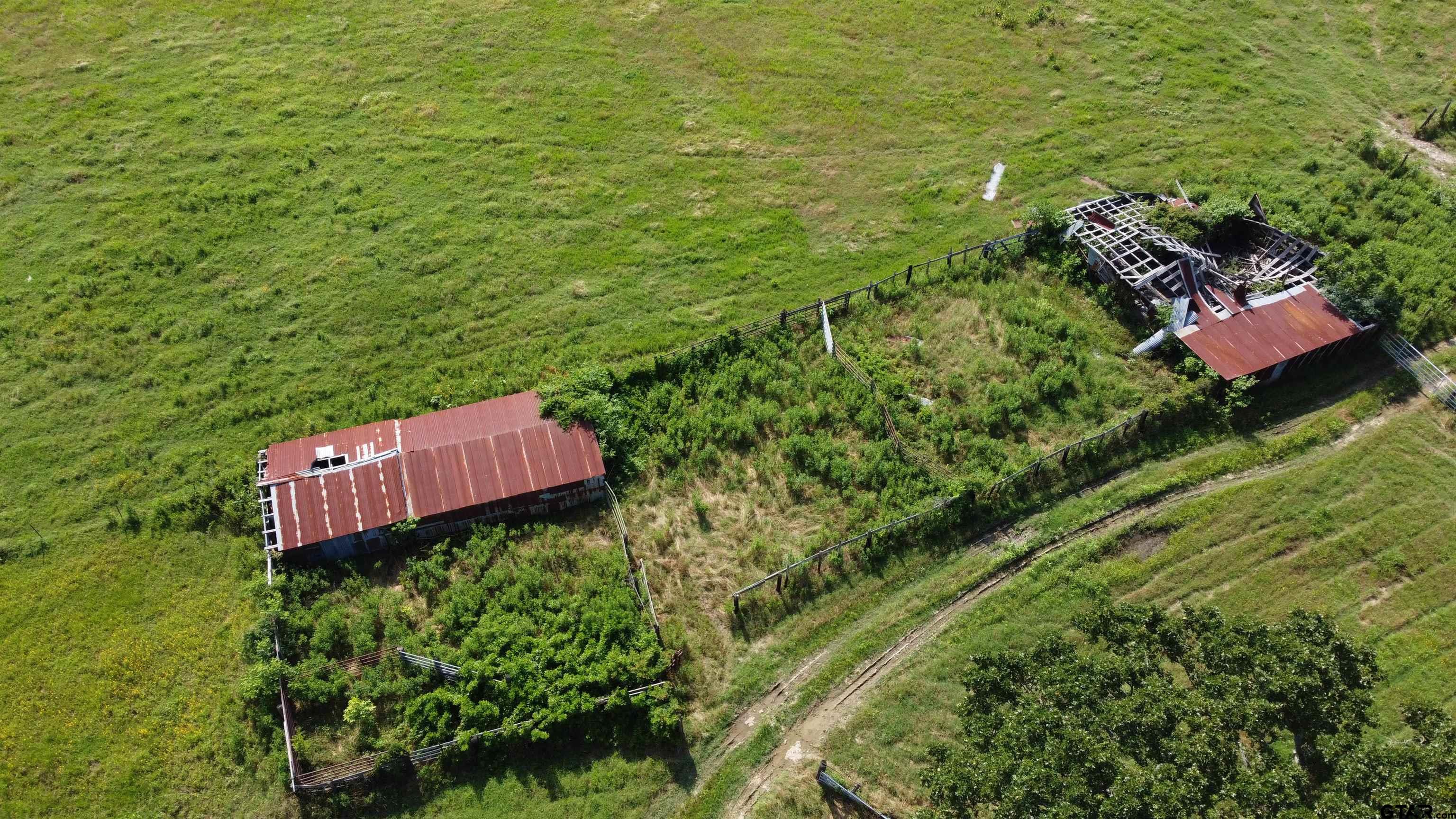 370 Rs Cr Emory, TX 75440 - Photo 5 of 9 an aerial view of a house with a garden