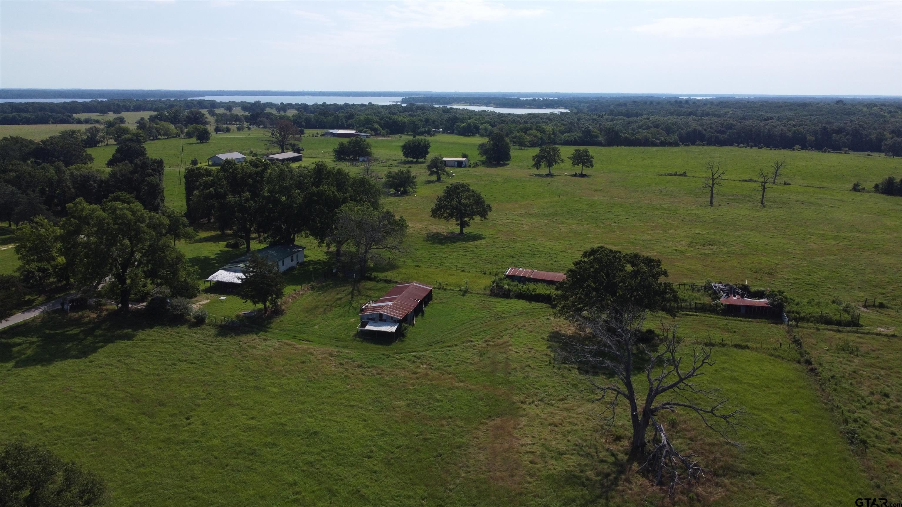 370 Rs Cr Emory, TX 75440 - Photo 7 of 9 an aerial view of a golf course with parking space