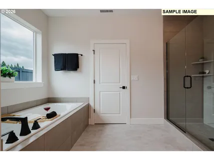 a picture of a room with a flat screen tv