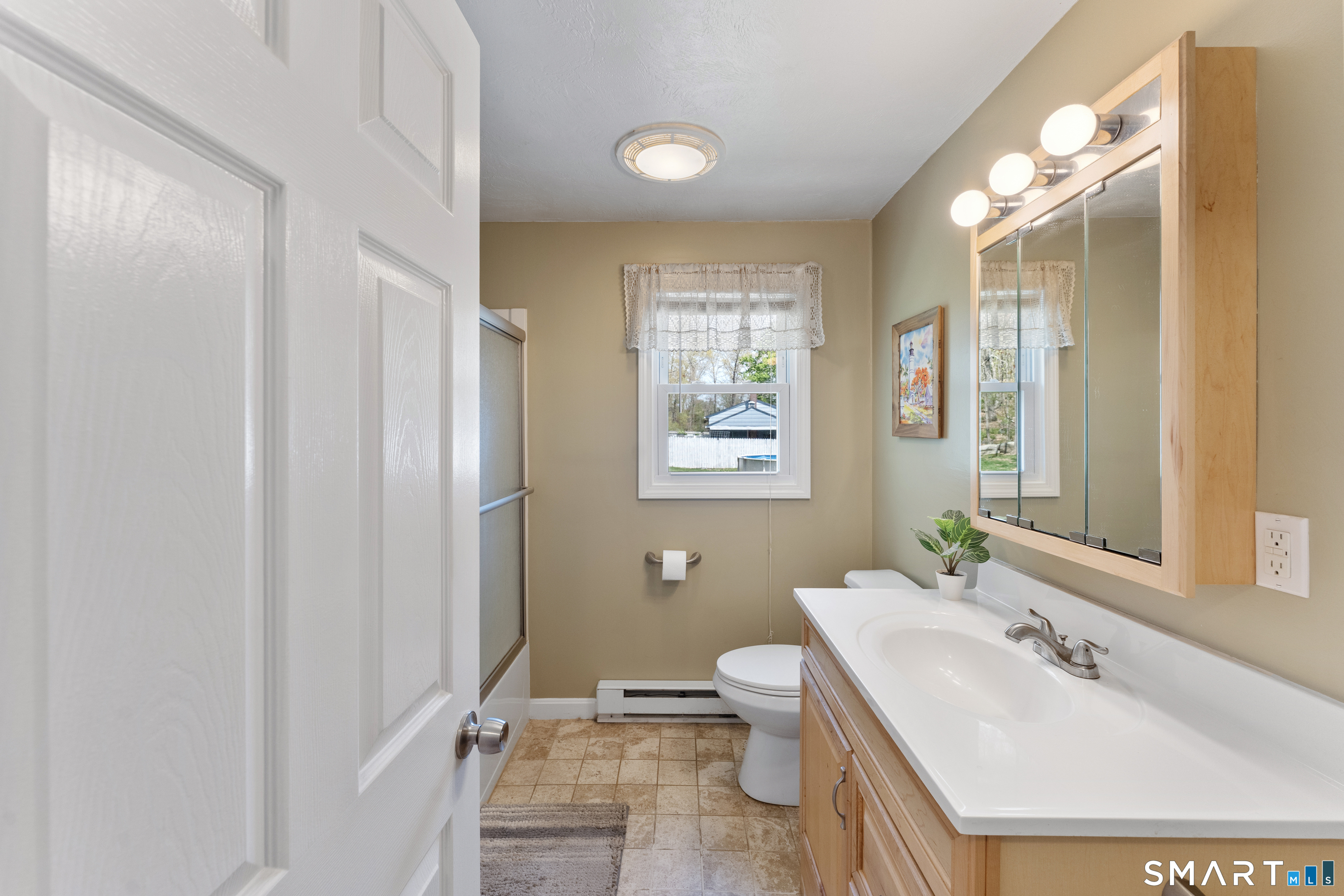 56 Thompson Hill Road Thompson, CT 06255 - Photo 25 of 38 a bathroom with a sink toilet and shower