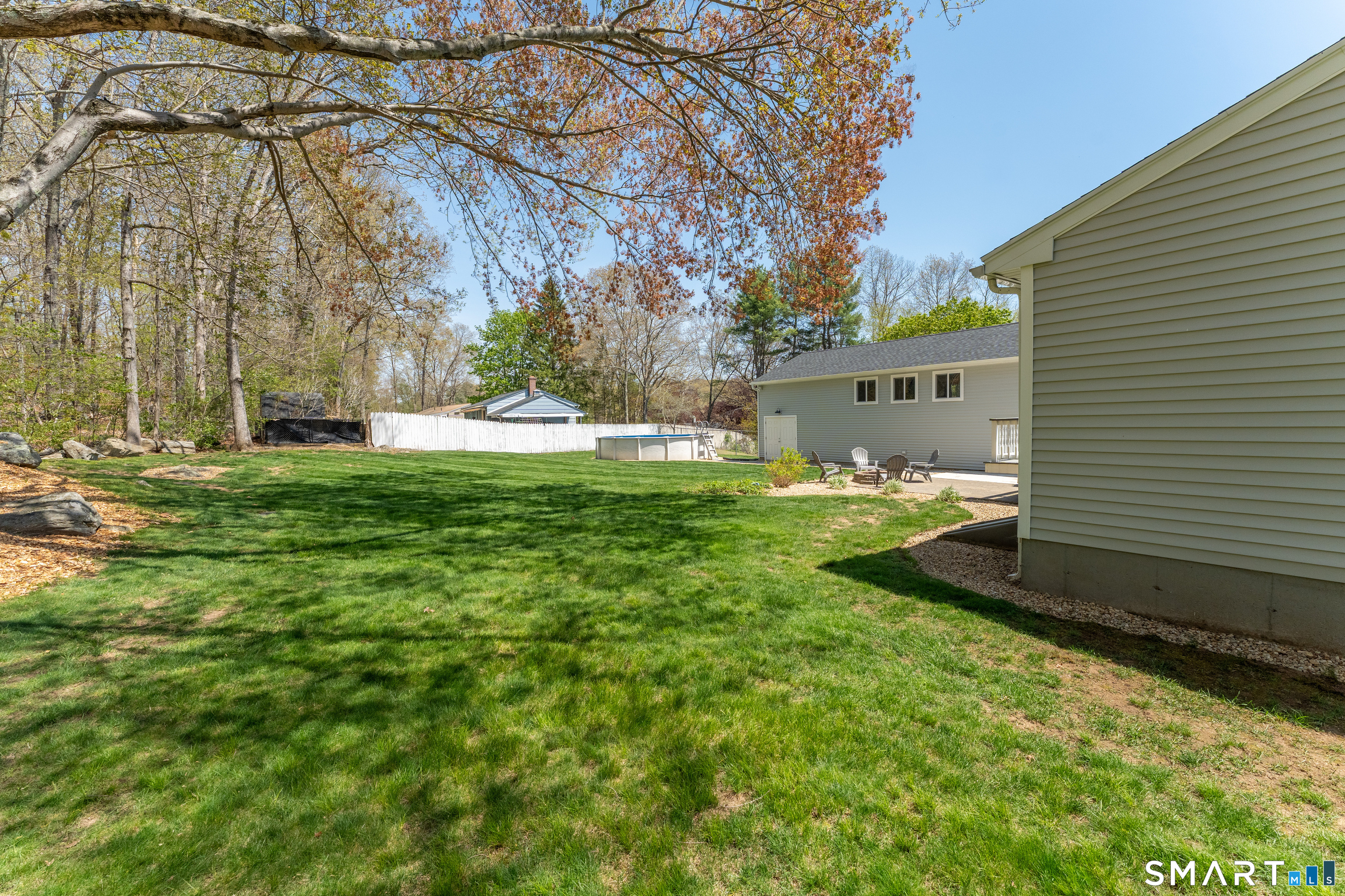 56 Thompson Hill Road Thompson, CT 06255 - Photo 32 of 38 a view of a house with a yard