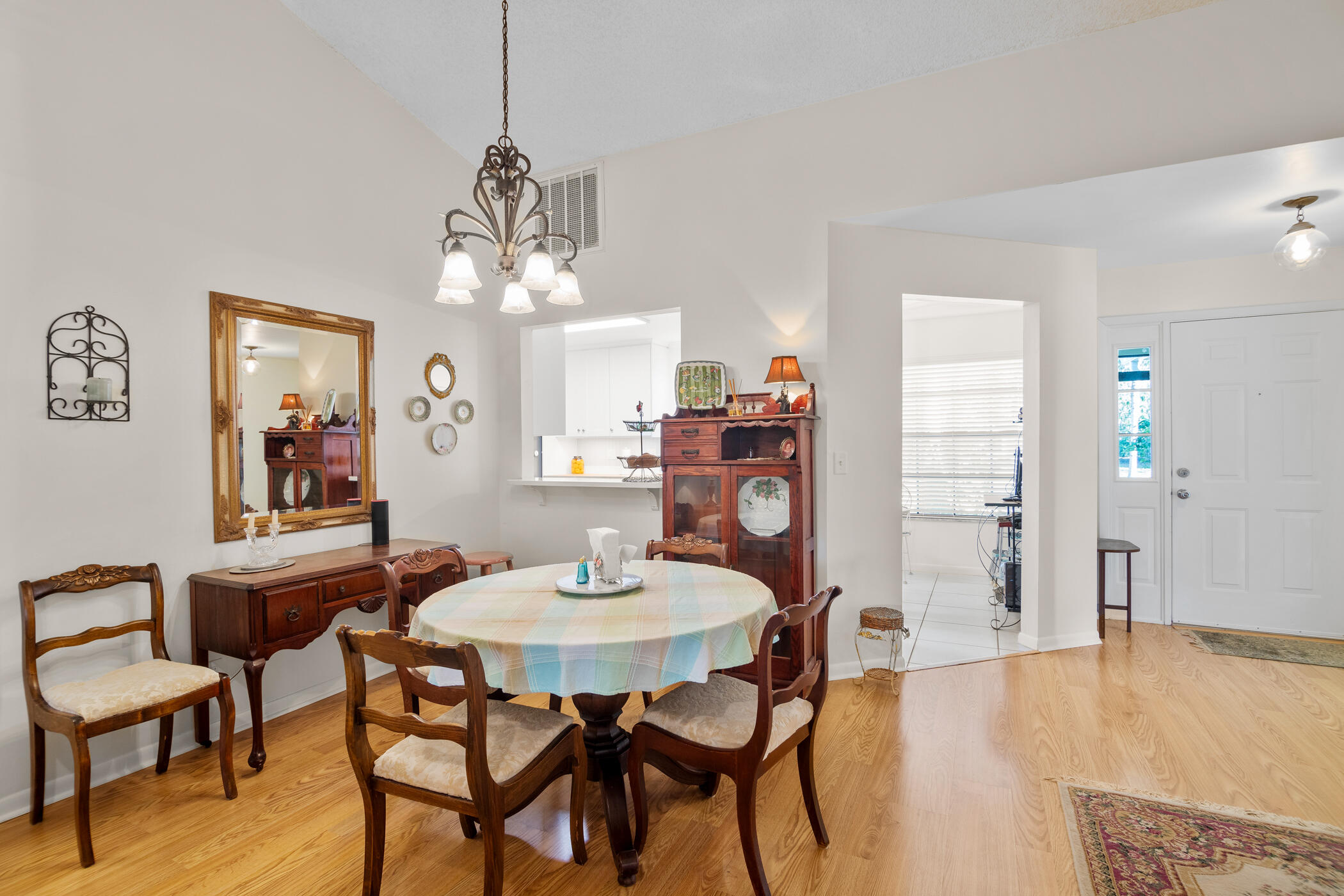 849 Gardener Road Rockledge, FL 32955 - Photo 8 of 31 a dining room with furniture and window