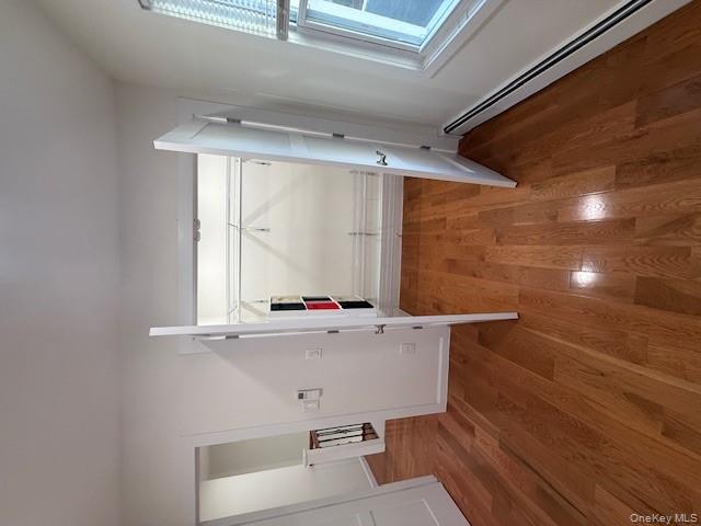 90-19 107th Avenue, Unit 2 Queens, NY 11417 - Photo 7 of 12 wooden floor in an empty room