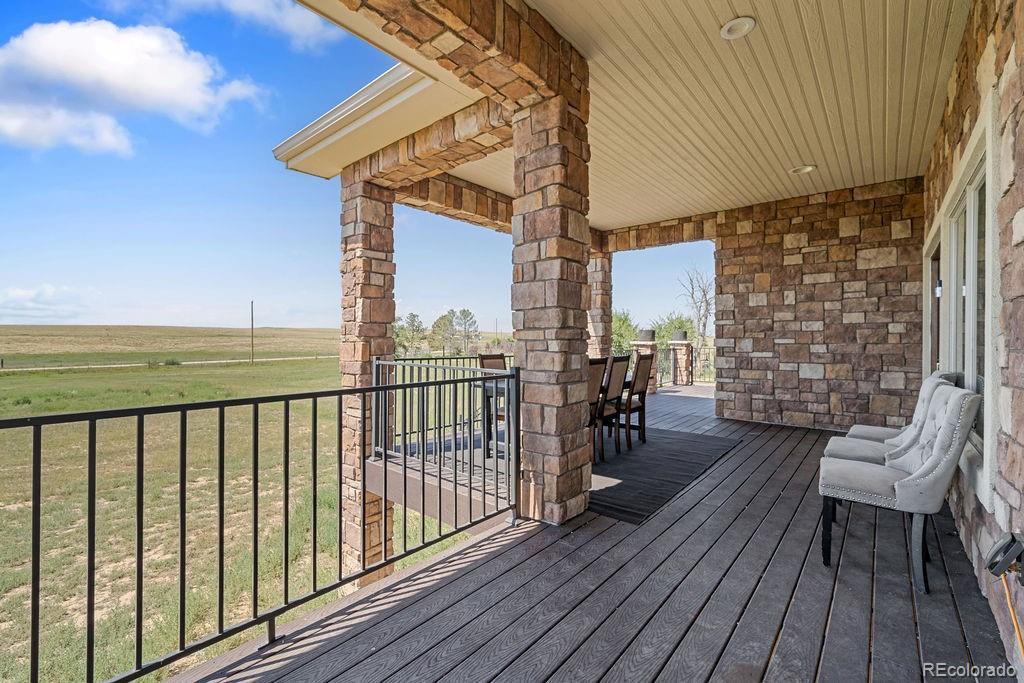 8450 Edison Road Yoder, CO 80864 - Photo 44 of 50 a view of a balcony with chairs