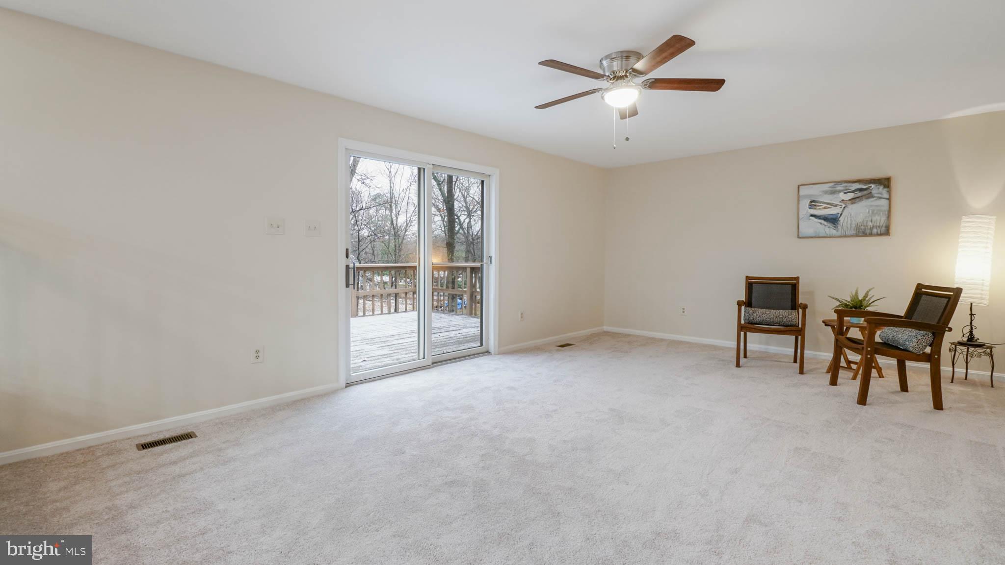 758 Fawnelm Road Severn, MD 21144 - Photo 12 of 29 Family room with slider on to large porch