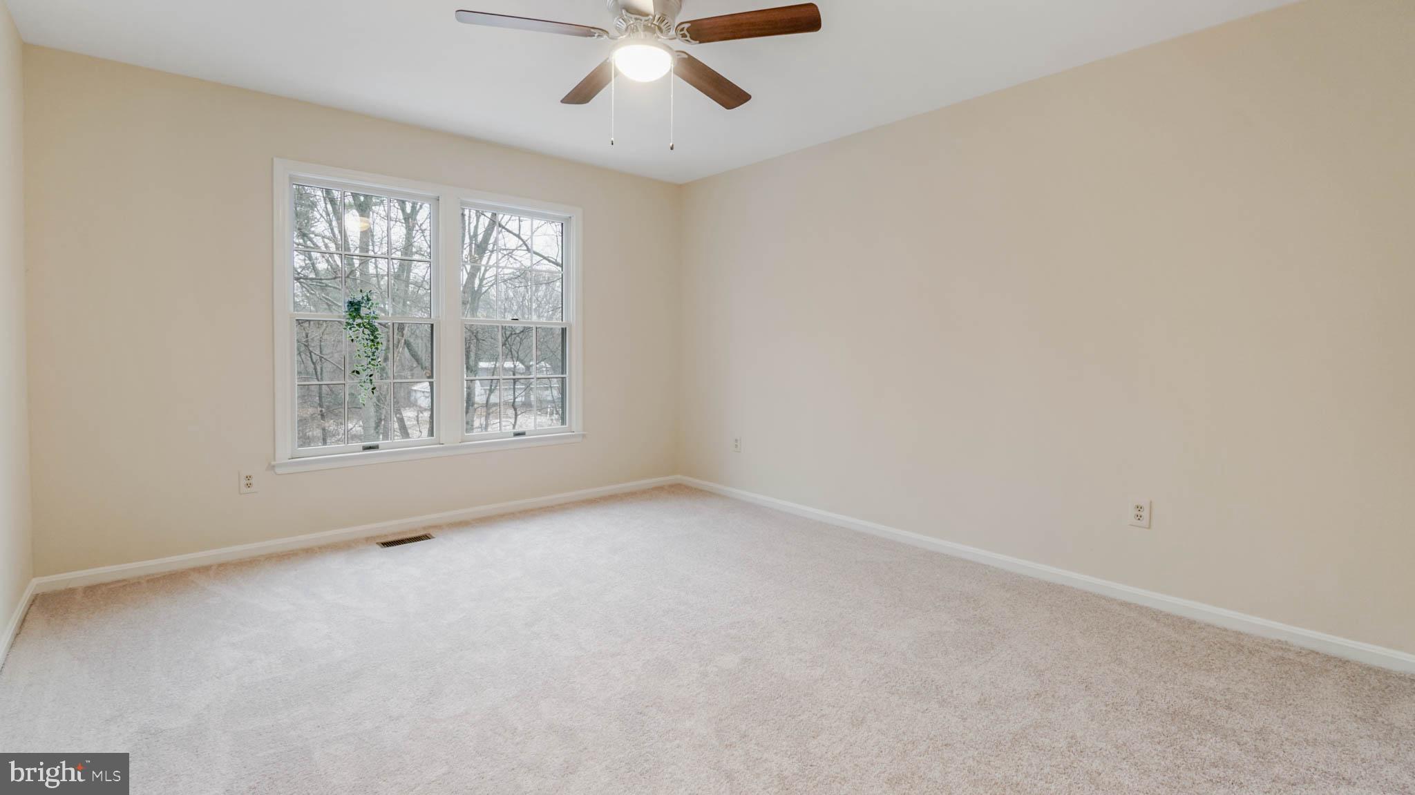 758 Fawnelm Road Severn, MD 21144 - Photo 18 of 29 Second bedroom looks out at wooded lot