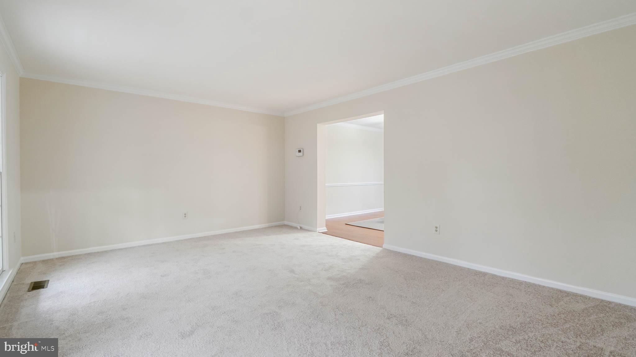 758 Fawnelm Road Severn, MD 21144 - Photo 6 of 29 Living room flows into dining room