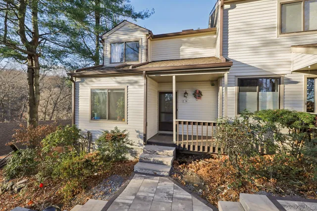 a view of a house with a small garden