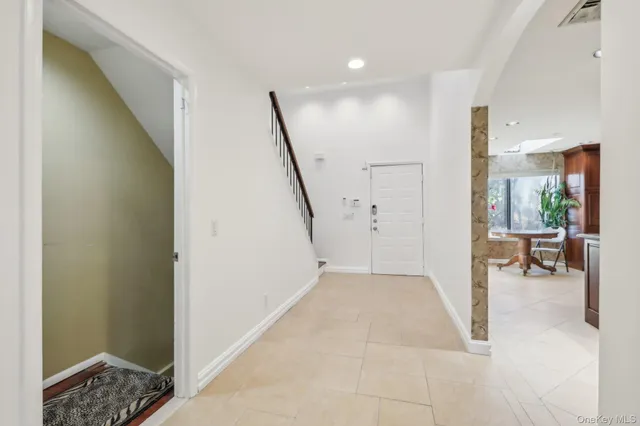 a view of livingroom with furniture and stairs