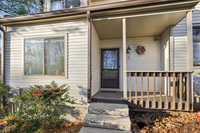 a front view of a house with a window