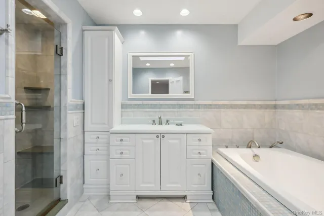 a bathroom with a sink and a bathtub