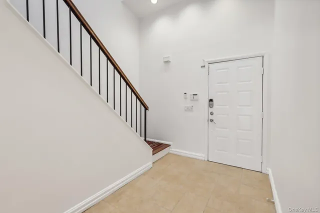 a view of a hallway with staircase