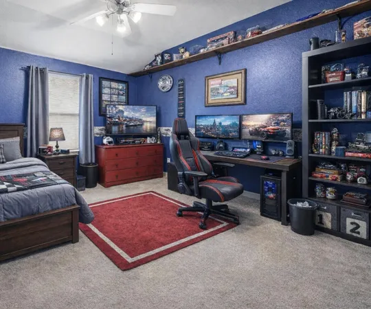 a bedroom with furniture and a book shelf