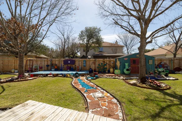 a view of swimming pool with outdoor seating and patio