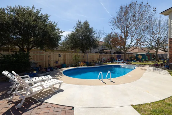 a view of outdoor space yard swimming pool and patio