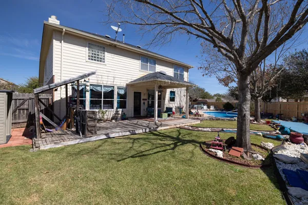 a view of a lounge chairs in a patio