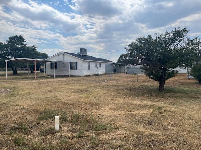 3811 Lakeview Road Hereford, TX 79045 - Photo 11 of 12 a view of a house with a yard