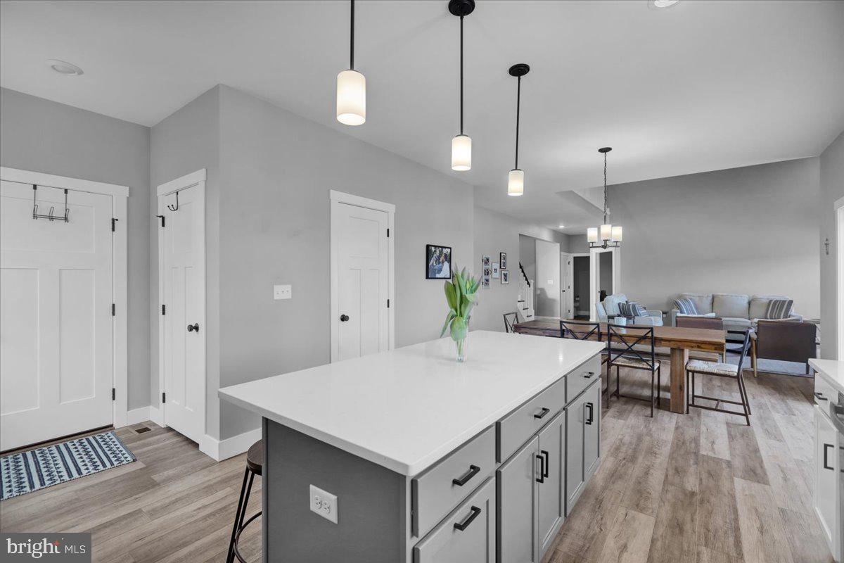 1057 Ryebrook Road Reading, PA 19608 - Photo 14 of 49 a kitchen that has a table chairs and wooden floor