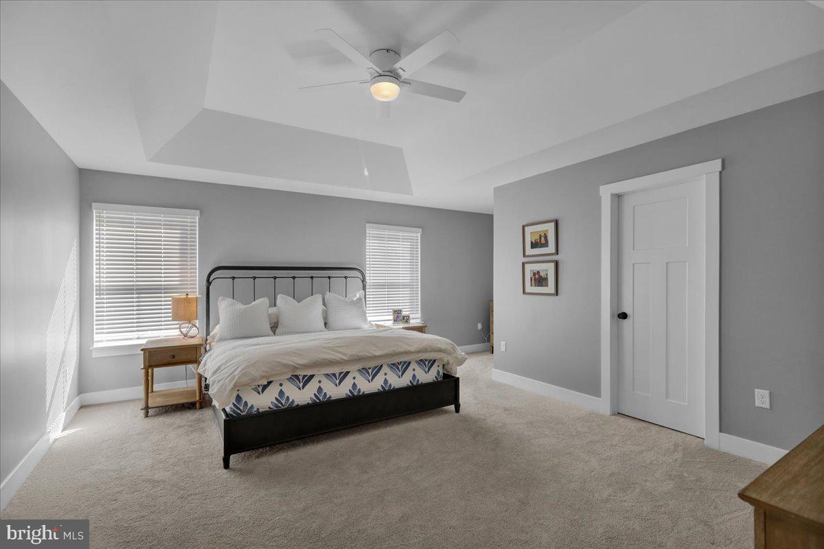 1057 Ryebrook Road Reading, PA 19608 - Photo 22 of 49 a bedroom with a bed and a ceiling fan