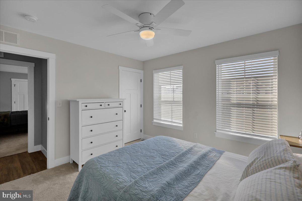 1057 Ryebrook Road Reading, PA 19608 - Photo 31 of 49 a bedroom with a bed a window and a flat screen television