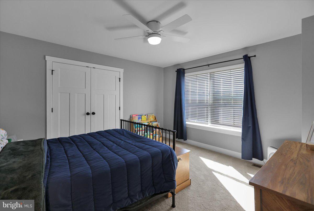 1057 Ryebrook Road Reading, PA 19608 - Photo 32 of 49 a spacious bedroom with a bed and a window