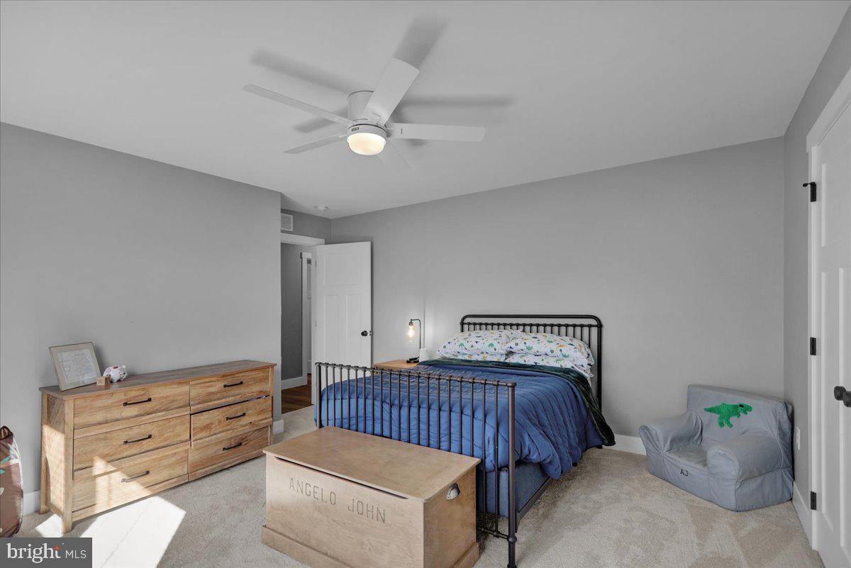 1057 Ryebrook Road Reading, PA 19608 - Photo 33 of 49 a bedroom with furniture and wooden floor