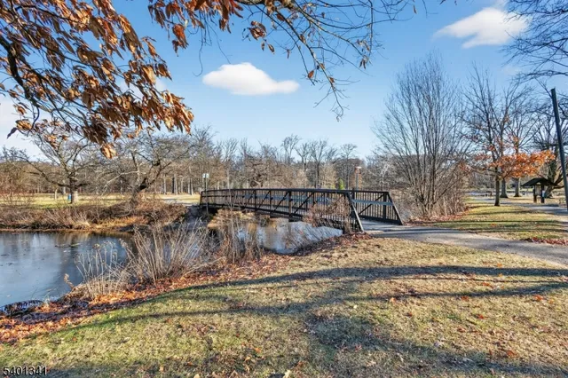 a view of a yard next to a house