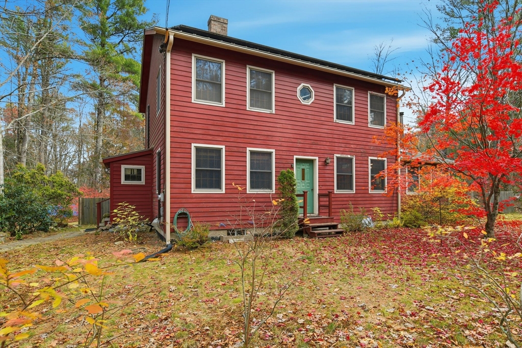 359 Montague Road Shutesbury, MA 01072 - Photo 1 of 38 a front view of a house with a yard