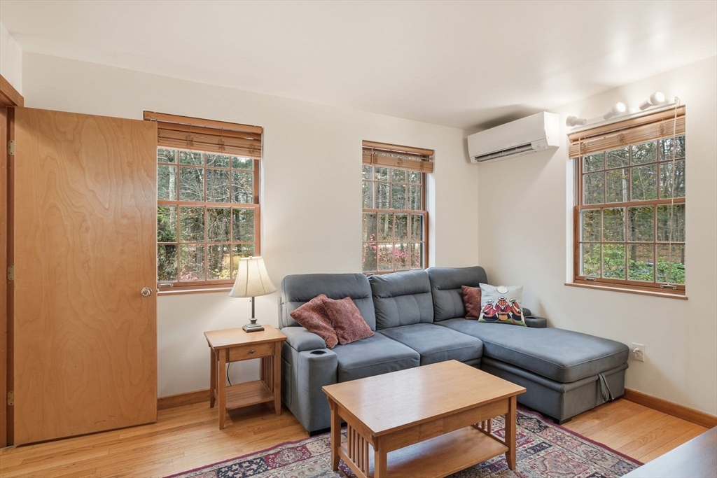 359 Montague Road Shutesbury, MA 01072 - Photo 12 of 38 a living room with furniture and a window